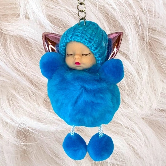 SLEEPY BABY WITH FAIRY WINGS SMALL POMPON IN BLUE KEYCHAIN CHARM - Picture 1 of 6